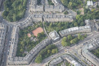 Oblique aerial view of Bellevue Crescent, St Mary's Parish Church, Northumberland Place and Drummond Place, looking WSW.