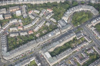 Oblique aerial view of East Claremont Street, looking NW.