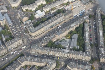 Oblique aerial view of Montgomery Street, Brunswick Street and Leith Walk, looking NNW.