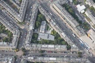 Oblique aerial view of Montgomery Street, Brunswick Street and Leith Walk, looking W.