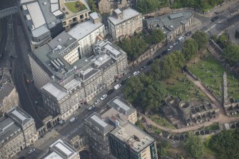 Oblique aerial view of Waterloo Place, looking NNE.