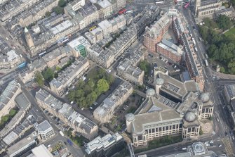 Oblique aerial view of Rutland Square, Rutland Street Screen Entrance and Caledonian Hotel, looking N.