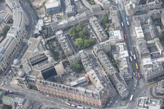 Oblique aerial view of Rutland Square, Rutland Street and Caledonian Hotel, looking SSW.
