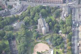 Oblique aerial view of St Cuthbert's Church and Burial Ground and St John's Episcopal Church and Churchyard, looking WSW.