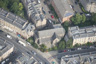 Oblique aerial view of All Saints Episcopal Church, looking N.