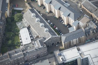 Oblique aerial view of the Church of the Sacred Heart, looking WSW.