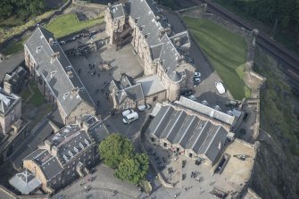 Oblique aerial view of Edinburgh Castle centred on the Governor's House, looking WNW.