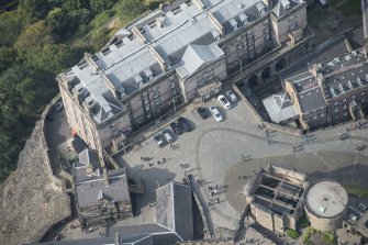 Oblique aerial view of the New Barracks and Military Prison at Edinburgh Castle, looking W.