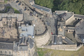 Oblique aerial view centred on the main entrance to Edinburgh Castle, looking N.