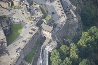 Oblique aerial view of Edinburgh Castle centred on the Portcullis Gate and Argyle Tower,  looking NW.