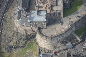 Oblique aerial view of Edinburgh Castle centred on the Crown Room,  looking W.