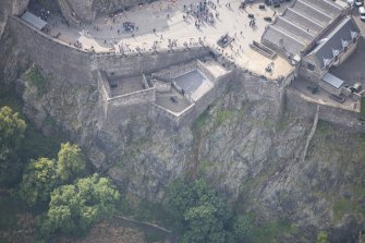 Oblique aerial view of Edinburgh Castle centred on the Argyle Battery,  looking S.