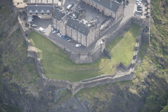 Oblique aerial view of Edinburgh Castle centred on the Western Defences,  looking ESE.