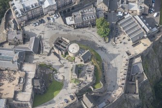 Oblique aerial view of Edinburgh Castle centred on St Margaret's Chapel,  looking WSW.