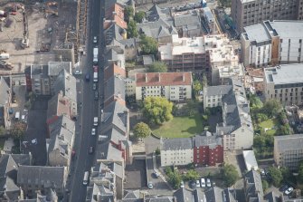 Oblique aerial view of Chessel's Court and Canongate, looking E.