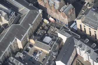 Oblique aerial view of Tailor's Hall, looking NW.