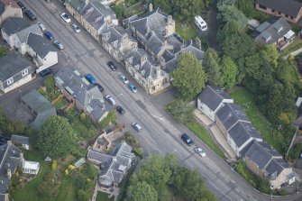 Oblique aerial view of Bridge Street and Parkend, looking NE.