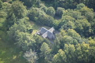 Oblique aerial view of Glencorse Old Parish Church, looking SE.