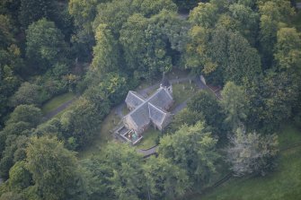 Oblique aerial view of Glencorse Old Parish Church, looking SW.