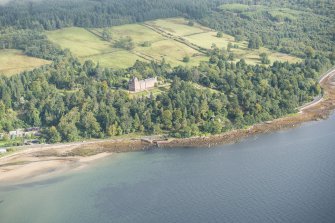 General oblique aerial view of Brodick Castle and Old Quay, looking NE.