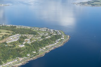 General oblique aerial view centred on Craigmore with Rothsay Bay beyond, looking NW.