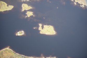 Oblique aerial view of Dun Raouill, looking NW.