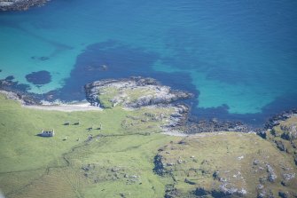 Oblique aerial view of the buildings at Eorisdale on South Vatersay, looking SE.