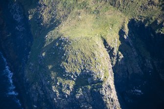 Oblique aerial view of Dun Briste, looking W.