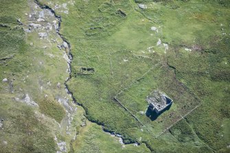 Oblique aerial view of Mingulay Chapel, looking SW.