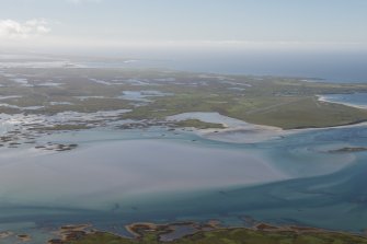 General oblique aerial view of Benbecula Airport and Gramsdale, looking S.