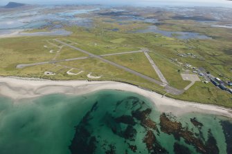 Oblique aerial view of Benbecula Airport, looking SE.