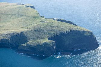 Oblique aerial view of Dun Briste and Barra Head Lighthouse, looking S.