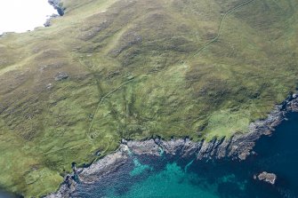 Oblique aerial view of Berneray Quay and The Aird, looking SW.