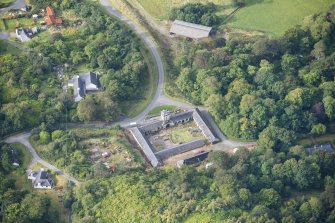 Oblique aerial view of Raasay House home farm, looking WSW.