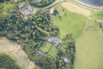 Oblique aerial view of Raasay House and home farm, looking SSE.