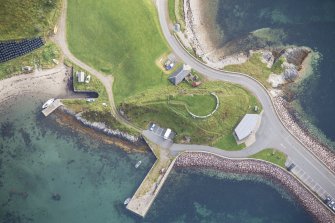 Oblique aerial view of Clachan Pier and battery, looking E.