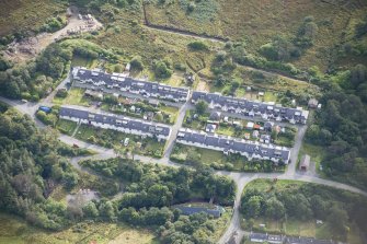 Oblique aerial view of Inverarish Miners' Housing, looking ESE.