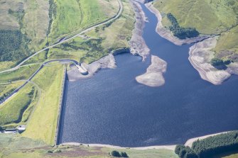 Oblique aerial view of Upper Glendevon Reservoir and dam, looking SSW.