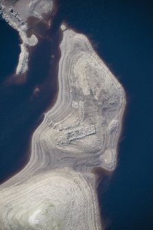 Oblique aerial view of a farmstead and enclosure in Upper Glendevon Reservoir, looking SSW.