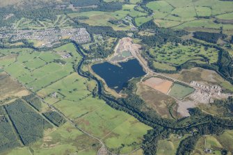 General oblique aerial view centred on Callander quarry, looking NNE.