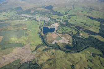 General oblique aerial view centred on Callander quarry, looking N.