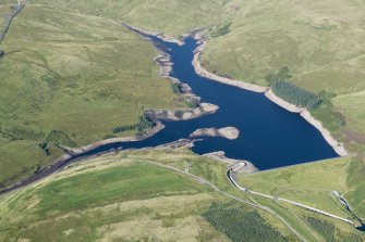 General oblique aerial view centred on Upper Glendevon Reservoir and dam, looking WNW.