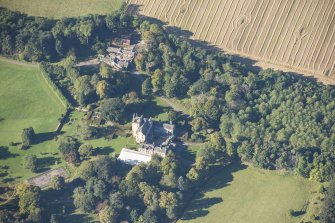 Oblique aerial view of Innes House, looking W.