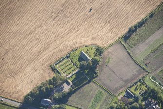 Oblique aerial view of Birnie Parish Church, looking SE.