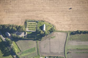 Oblique aerial view of Birnie Parish Church, looking E.