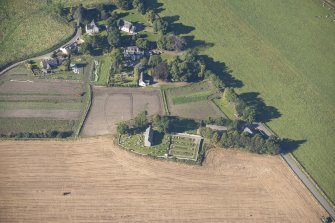 Oblique aerial view of Birnie Parish Church, looking W.