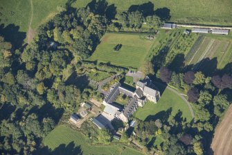 Oblique aerial view of Pluscarden Abbey, looking WNW.