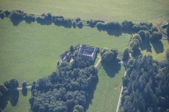 Oblique aerial view of Altyre House Stables, looking S.