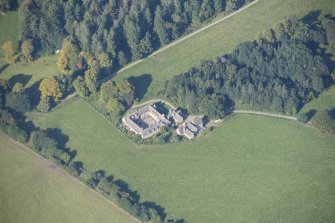 Oblique aerial view of Altyre House Stables, looking WNW.