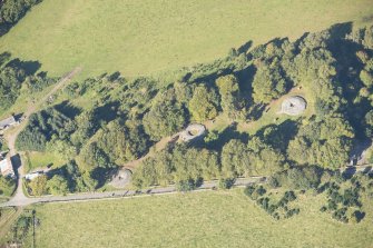 Oblique aerial view of Clava Cairns, looking NNW.
